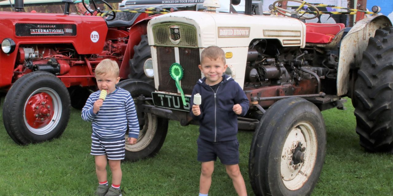 Fun, sun, ice cream and tractors – 12 great pictures by Sean Doyle from Honley Show Centenary Event