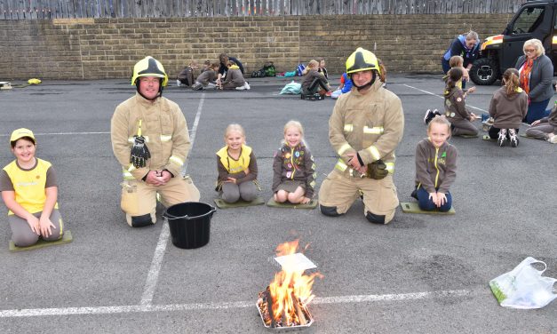 Brownies and Guides light fires at Slaithwaite Fire Station in first face-to-face event after Covid-19