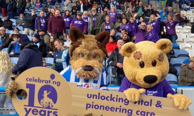 Giant key unlocks Forget Me Not’s 10th birthday celebrations at Huddersfield Town game