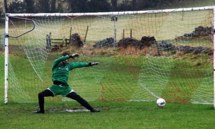 Keeper rooted in the mud with moves like Jagger on a rain-hit day in the Huddersfield District League