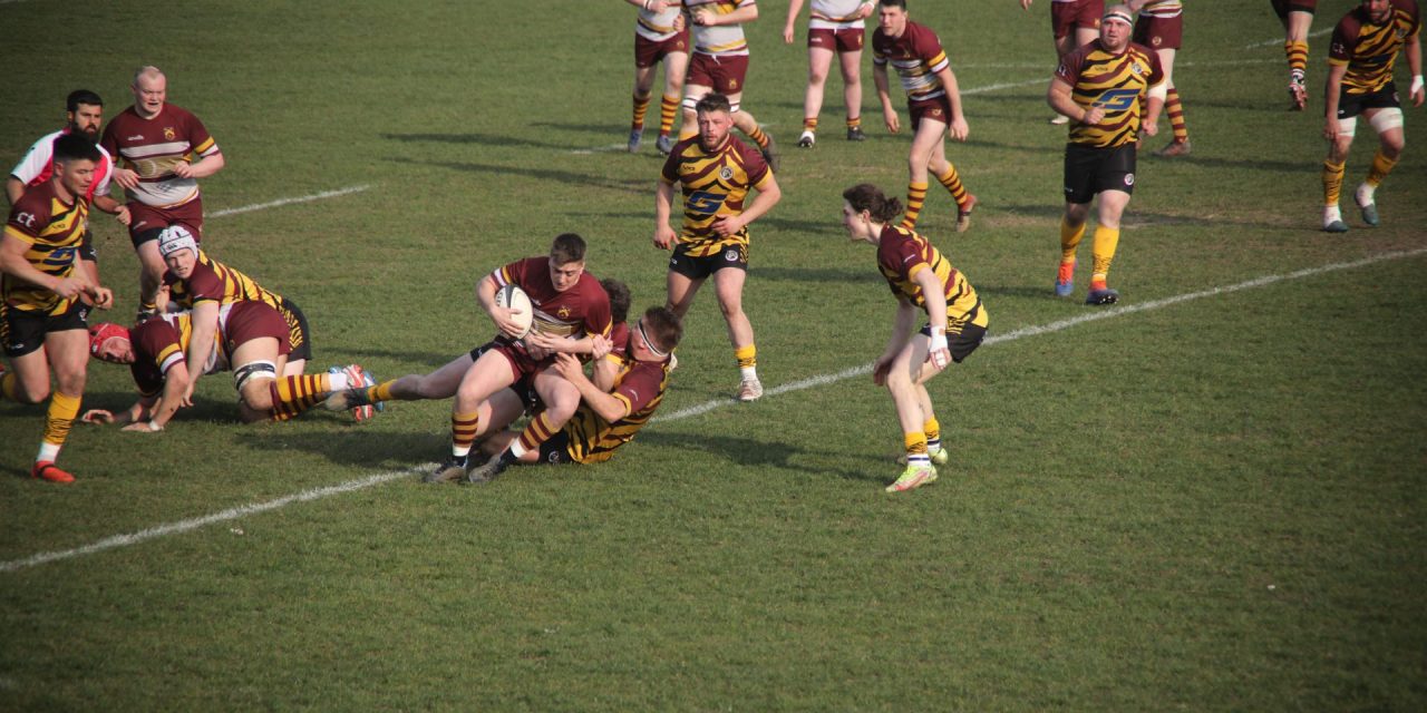 Huddersfield RUFC skipper Lewis Bradley leads from the front but Sheffield Tigers show steel to clinch victory