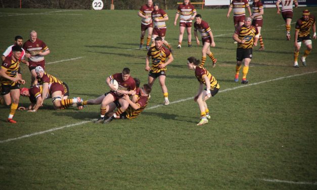 Huddersfield RUFC skipper Lewis Bradley leads from the front but Sheffield Tigers show steel to clinch victory