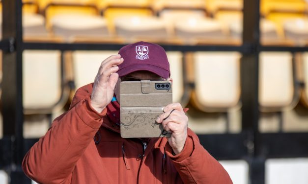 Fan Gallery: Our snapper is snapped by mystery man in a cap as fans raise a glass to Emley’s seventh win in eight matches