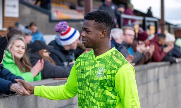 On-loan Huddersfield Town keeper Michael Acquah earns the plaudits as Emley AFC clinch seventh win in eight matches