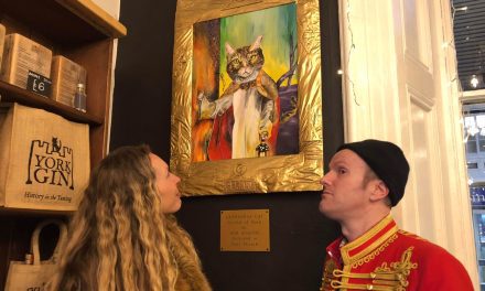 Artist Rob Martin unveils portrait of Gerald the York Minster cat at York Railway Station
