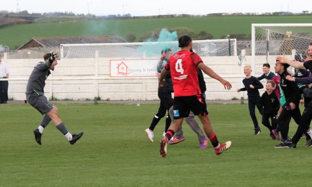 Some people are on the pitch…they think it’s all over! It is now. Golcar United are promoted!