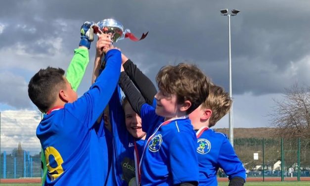 All for one! Smiles and fun were the order of the day at USW Grassroots Football Festival at Leeds Road Playing Fields