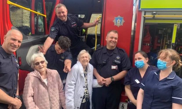 Residents at Lindley Grange Bupa Care Home get a lift from visit of firefighters from Rastrick Fire Station