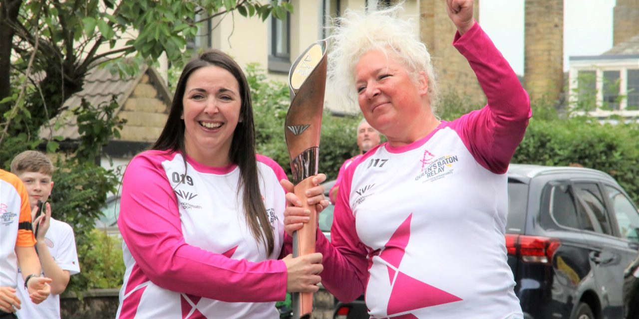 Smiles say it all as the Birmingham 2022 Queen’s Baton Relay passes through Huddersfield