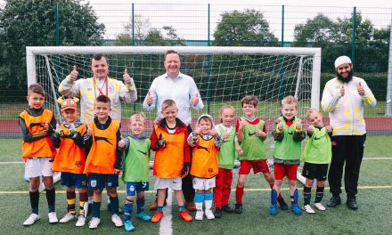 MP Jason McCartney visits Huddersfield Town Foundation summer football camps and sees youngsters having a great time
