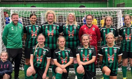 Golcar United Women FC celebrate first trophy of the campaign before the season even kicks off
