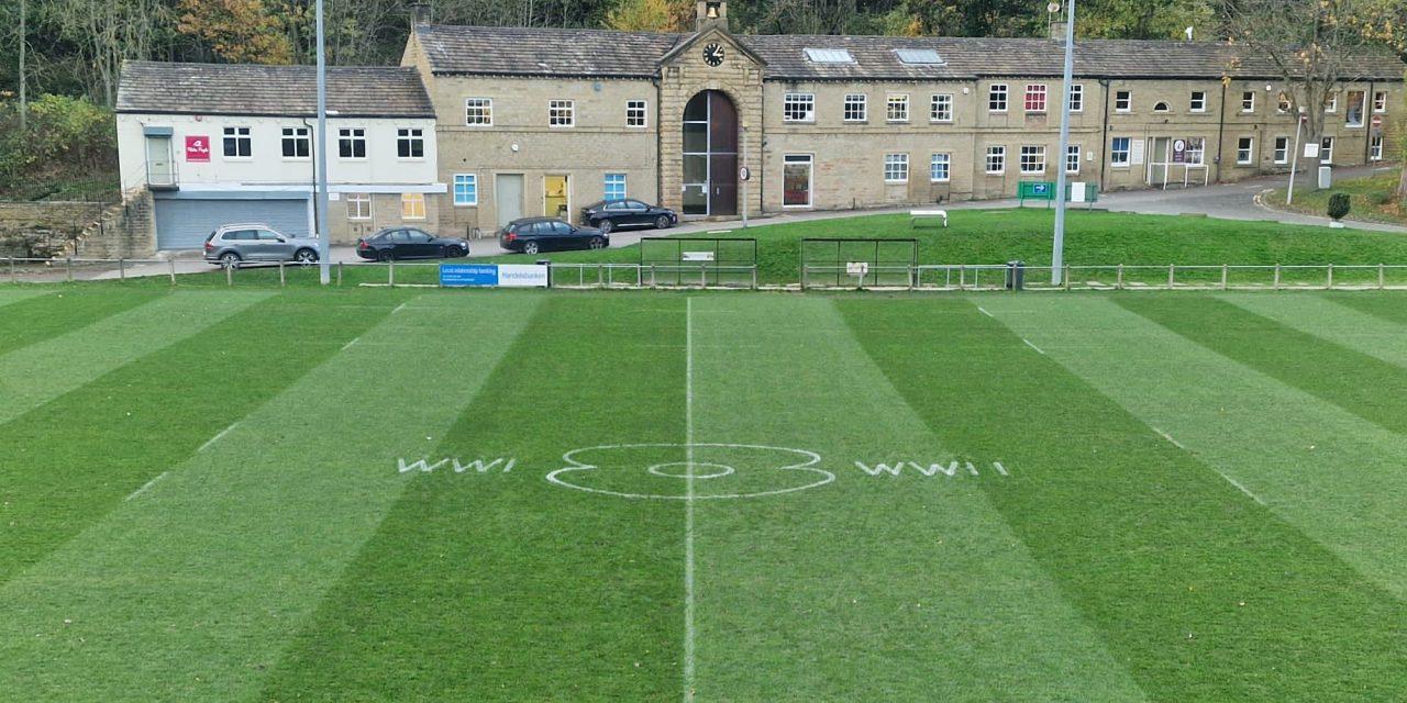 Poppy painted on the pitch at Huddersfield RUFC’s Lockwood Park as a symbol of Remembrance