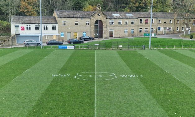 Poppy painted on the pitch at Huddersfield RUFC’s Lockwood Park as a symbol of Remembrance