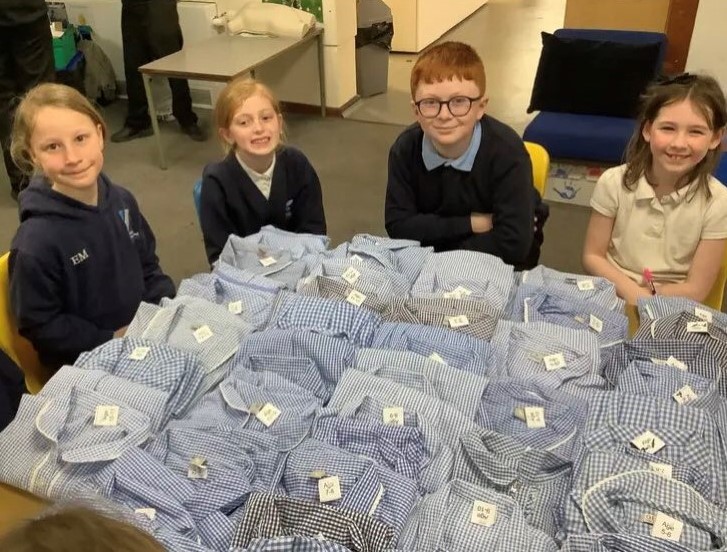 Pupils save their parents a fortune by holding school uniform giveaway days