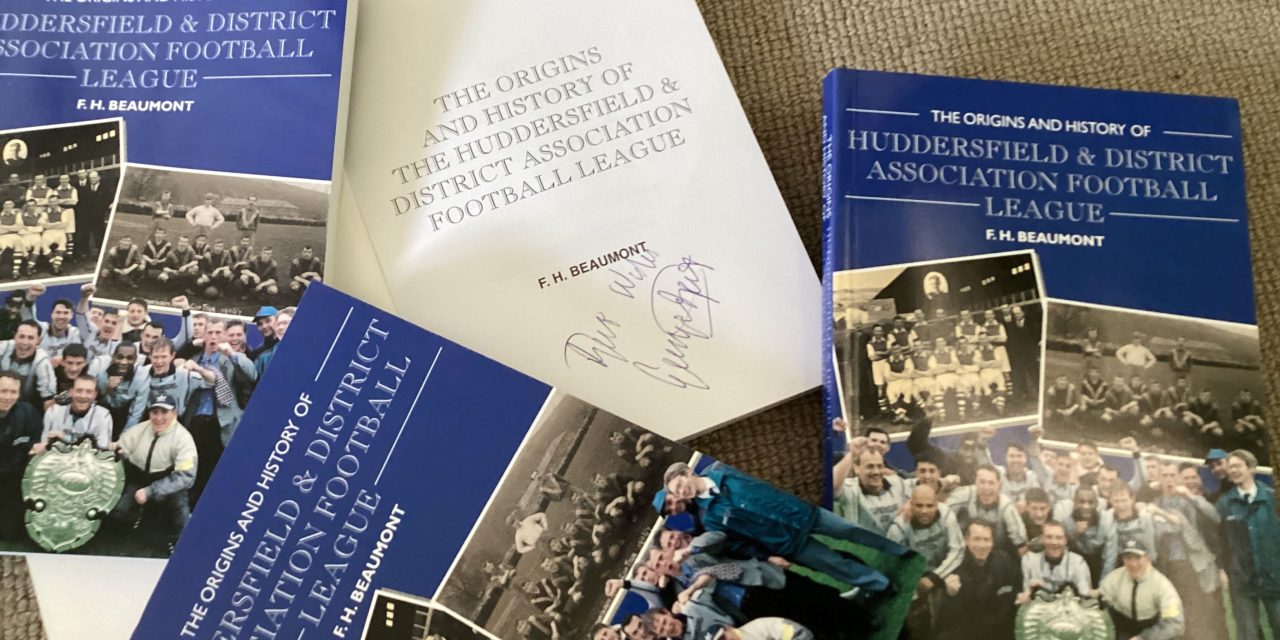 It’s competition time! Win a Huddersfield collector’s item signed by football legend George Best