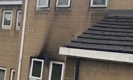 Man dies after suspected arson attack at Huddersfield flats where young family had to jump for their lives
