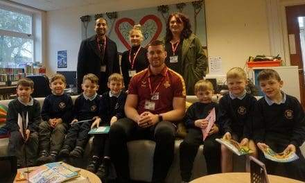 Valli Opticians and Huddersfield Giants help inspire reading at Honley school on World Book Day