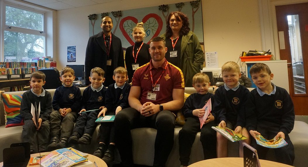 Valli Opticians and Huddersfield Giants help inspire reading at Honley school on World Book Day