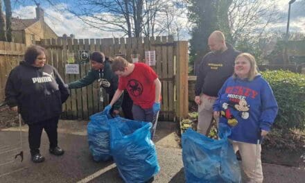 Residents at Langdale House learn about caring for the environment starting with a litter pick
