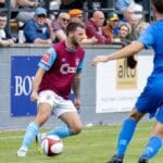 A Luke Parkin penalty keeps high-flying Emley AFC top of the table despite sending off